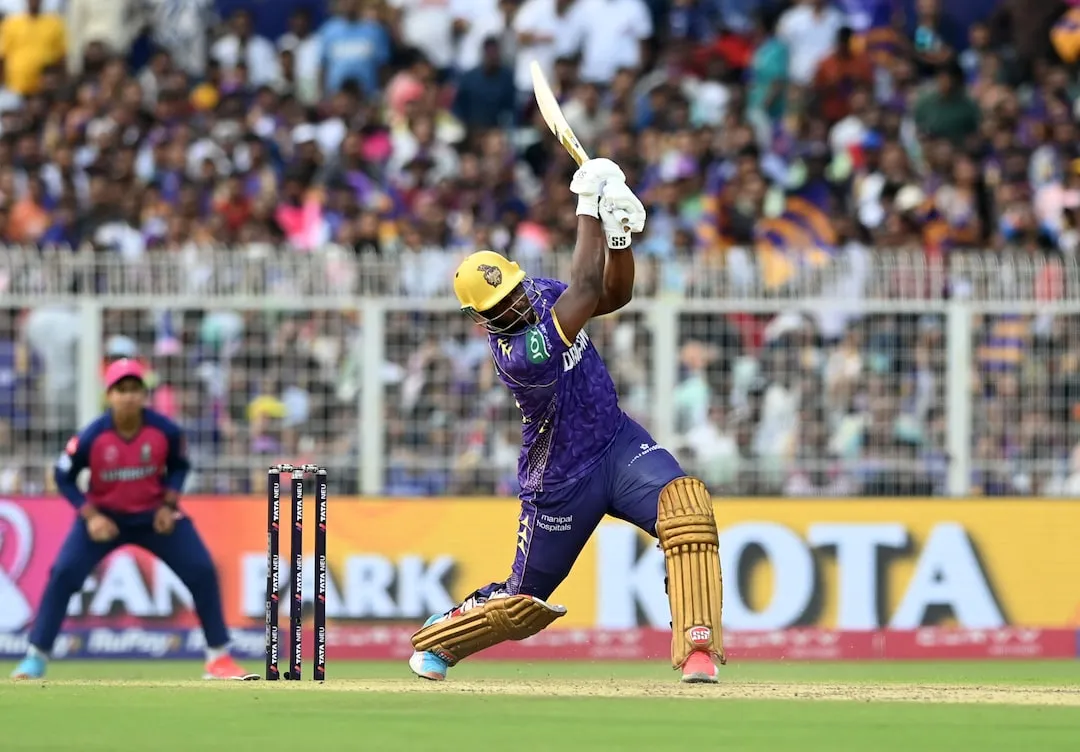 Batsman hitting six over boundary rope
